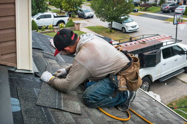 Professional Roofing technician working in Coolin, ID